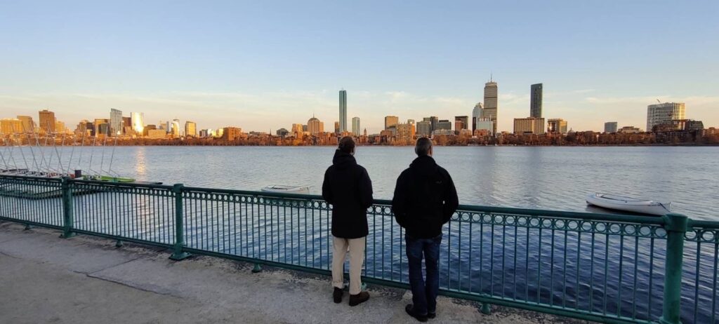 GeoEpi team members Steffen Knoblauch and Apl. Prof. Dr. Sven Lautenbach appreciating the Boston skyline at CGA 2023.