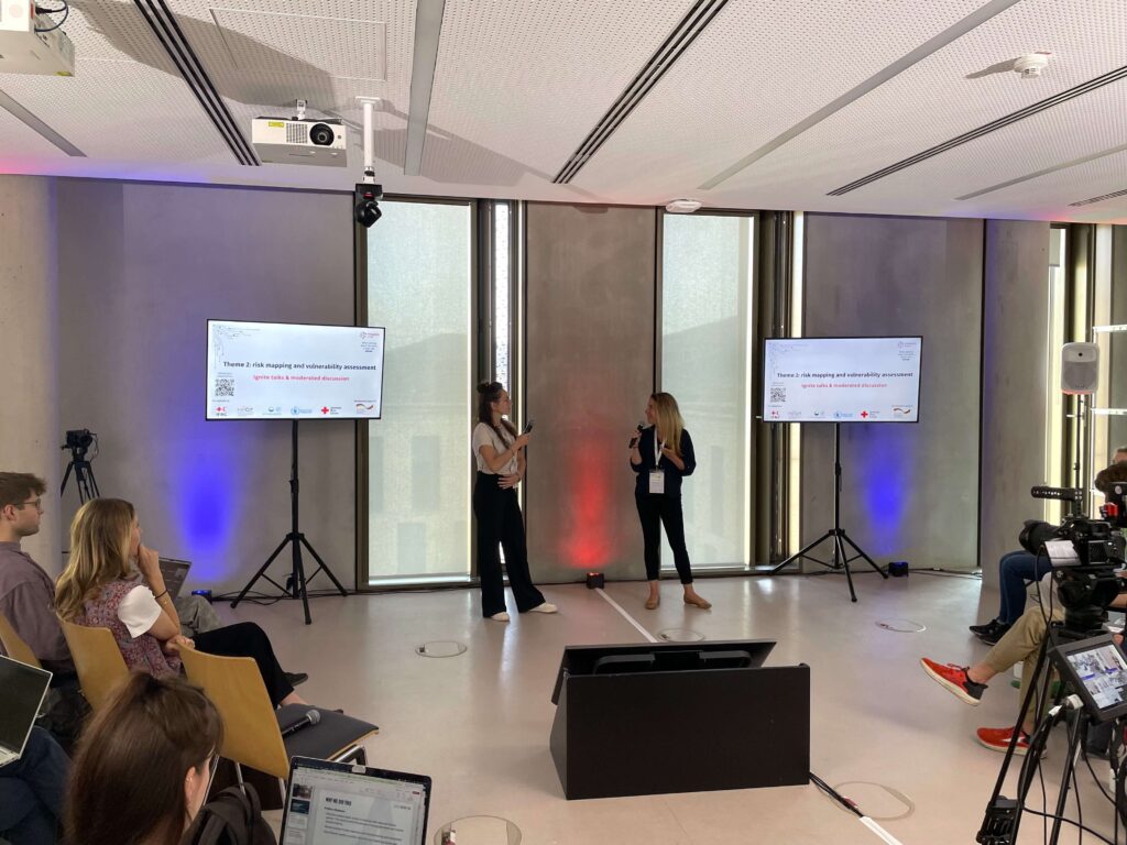 two woman presenting 