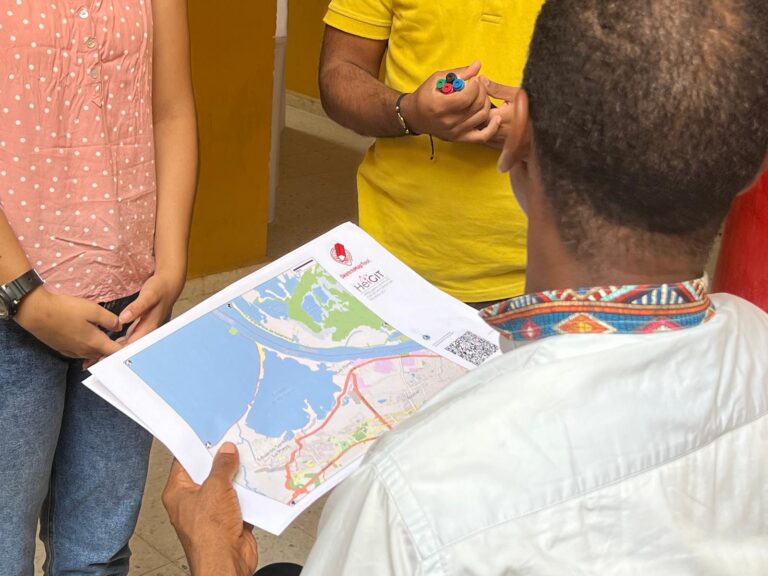 people holding a paper map