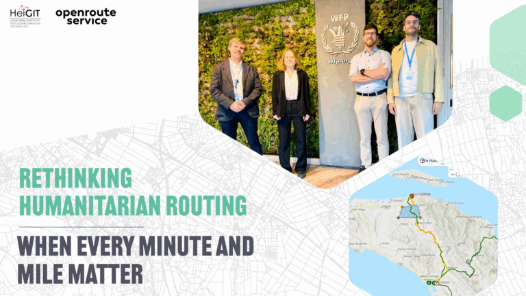 Four people standing in front of a wall with the World Food Programme logo and a green plant background, wearing conference badges.