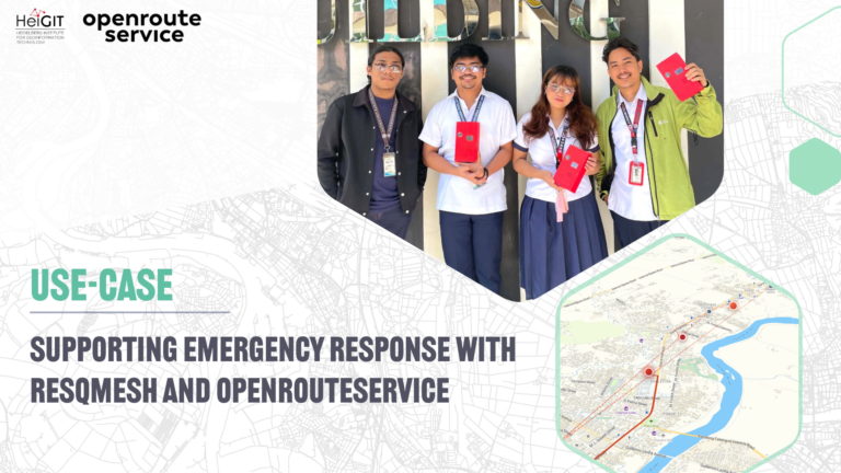 Four young people stand in front of a map with marked routes holding red objects in their hands
